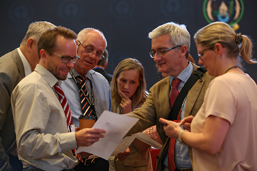 EU delegates discuss the proposed outcomes from informal discussions